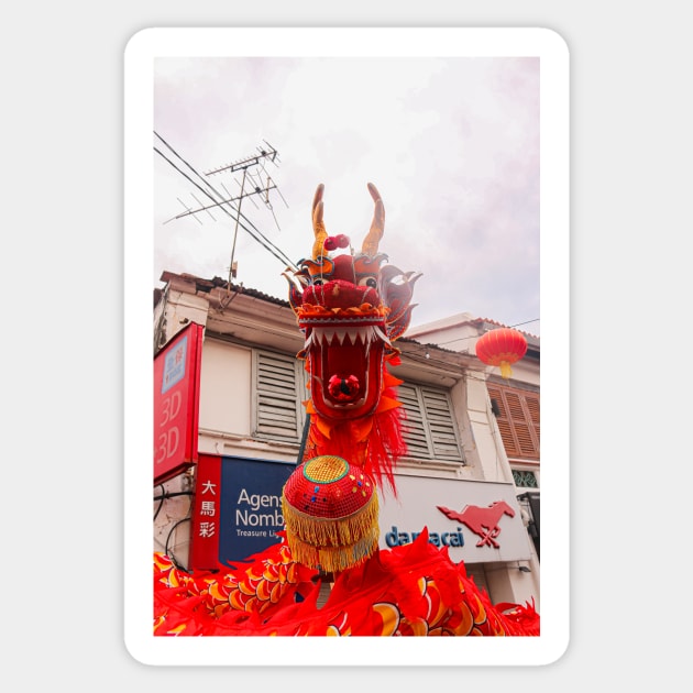 A head of a long red dragon Sticker by kall3bu